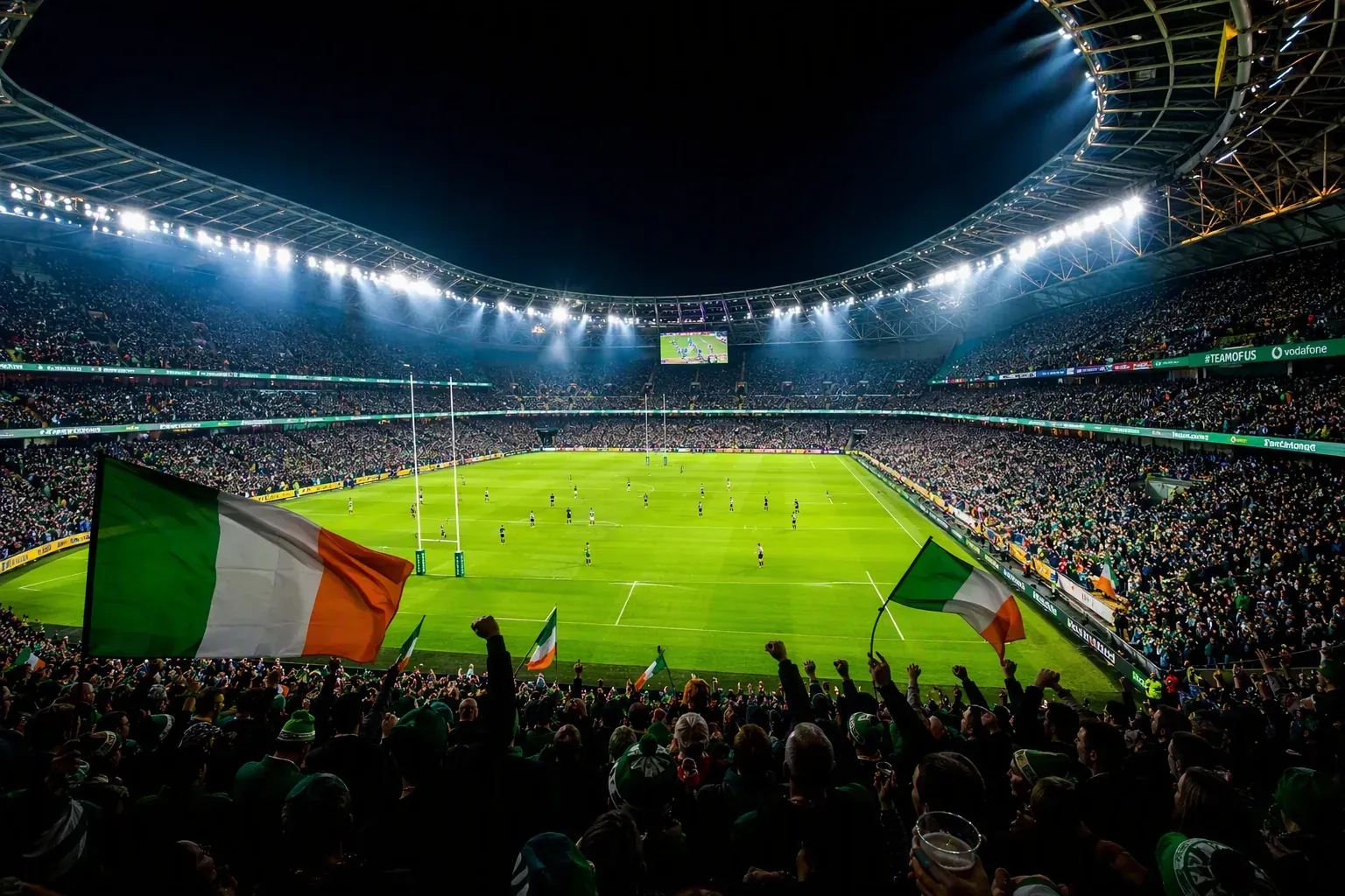 Best IPTV Ireland for sport — packed Irish stadium with tricolour flags under floodlights